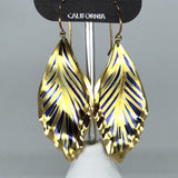 Holly Yashi Earrings - Blue and gold tone freeform